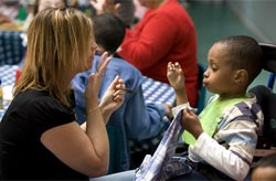 Adult and child using sign language